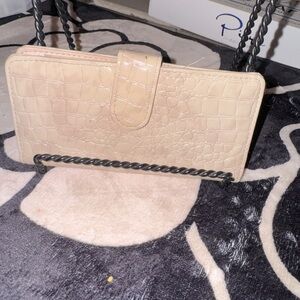 light beige faux crocodile long wallet with a  flap button closure